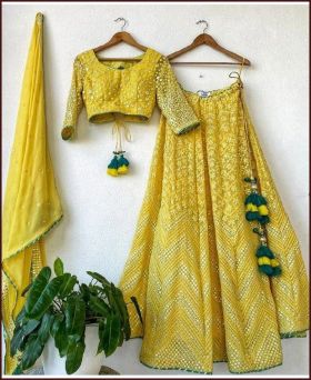 Exclusive Georgette Embroidery Work Yellow Wedding Lehenga Choli