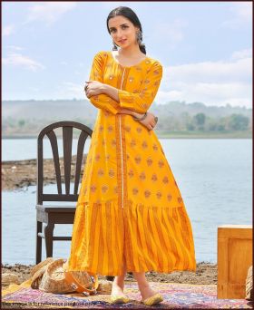 Glamorous Rayon Foil Print Yellow Colour Gown