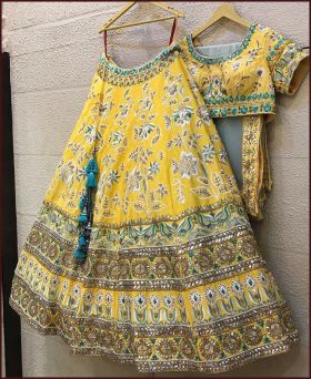 Wonderful Malai Satin Embroidered Yellow Bridal Lehenga Choli