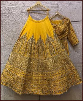Partywear yellow heavy Italian silk embroidery sequence work lehenga